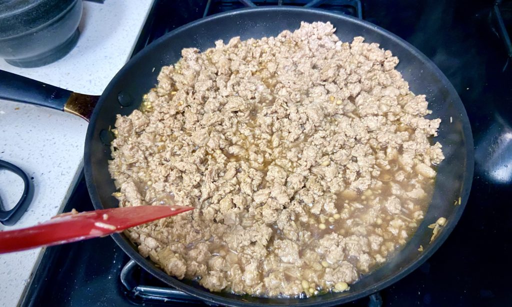 ground turkey in a cooking pan
