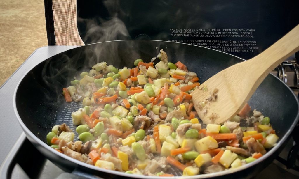 Fry pan cooking fried rice ingredients
