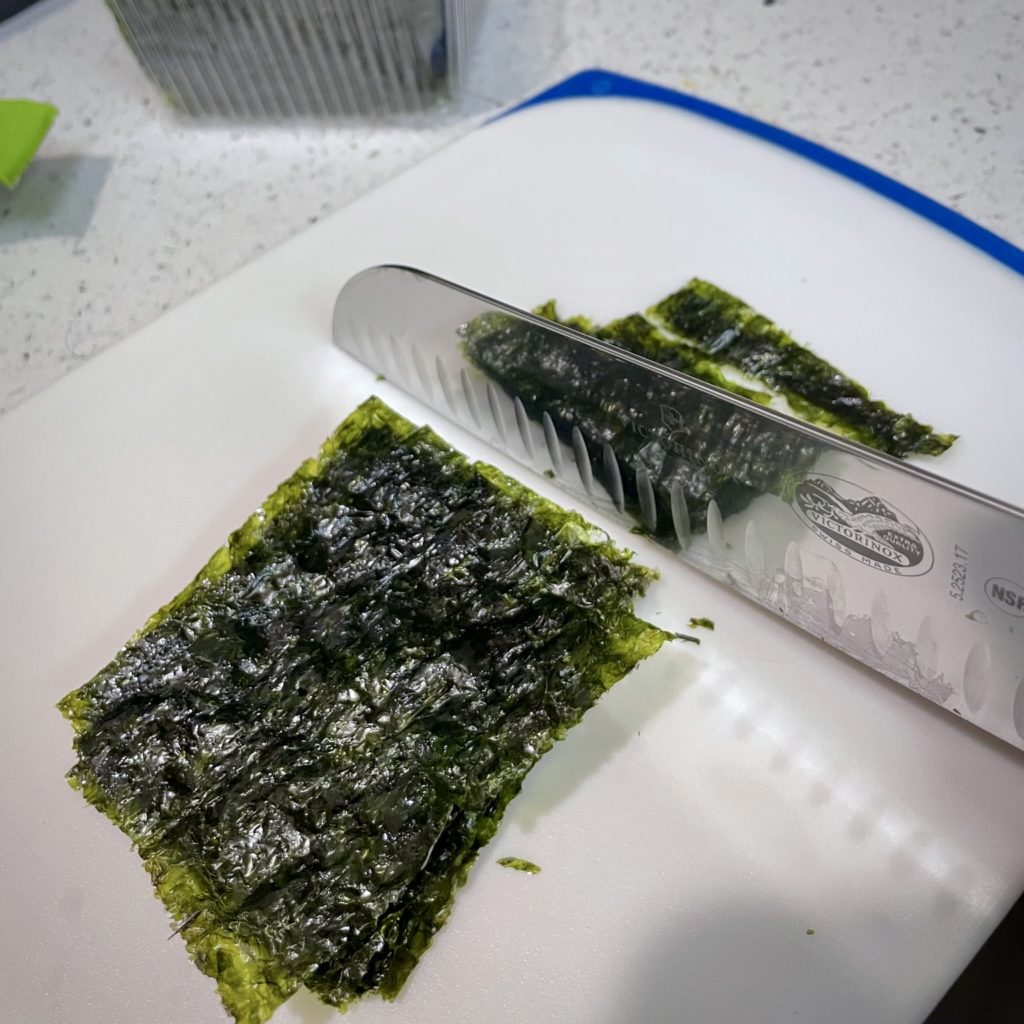 seaweed sheets being cut into strips