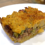 Rectangular slice of Pastelon served on a white plate